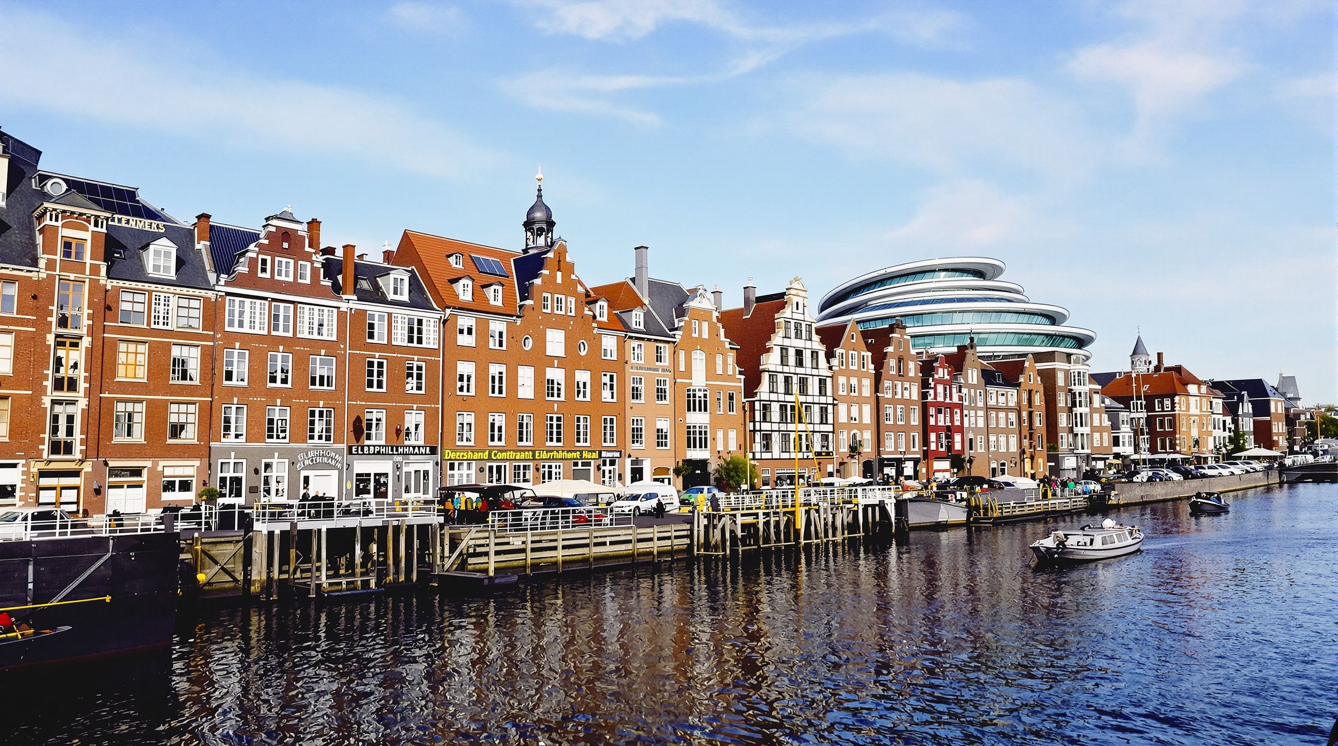 Historic Speicherstadt warehouses and modern Elbphilharmonie in Hamburg.