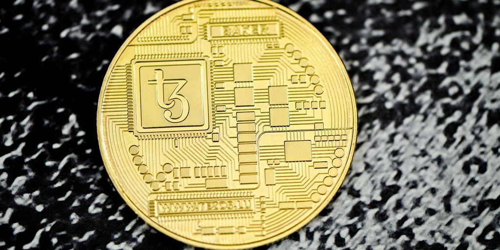 a close up of a coin on a black surface Bison Bitcoins