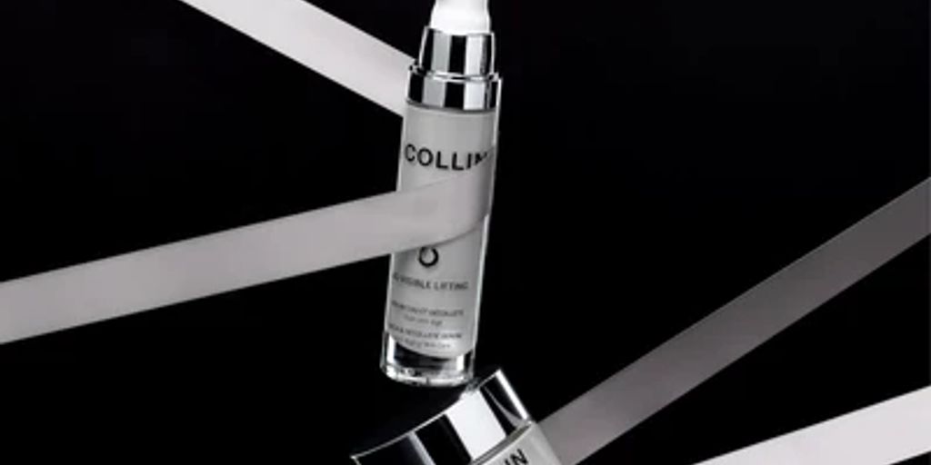 Cosmetic products displayed elegantly with reflective ribbons and dark background.