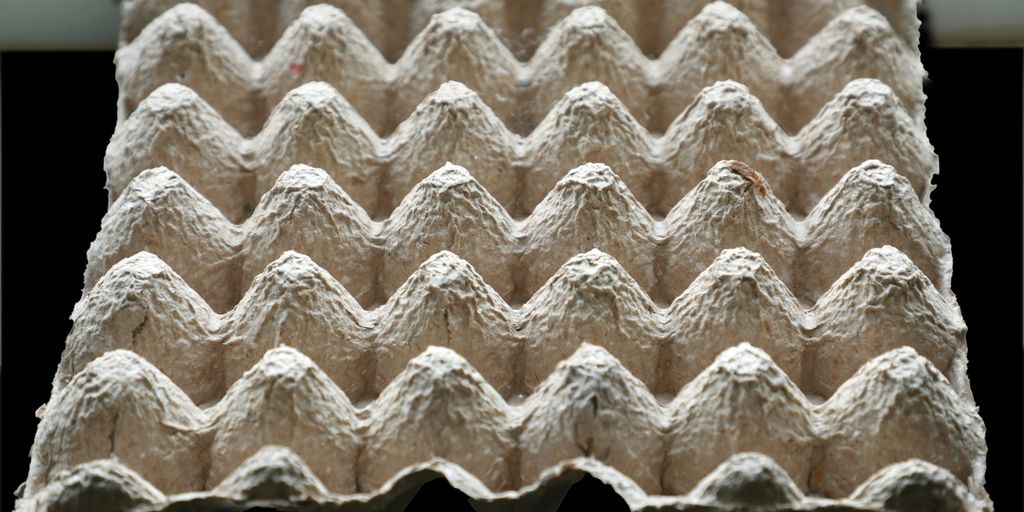 A close up of a piece of paper with a wave pattern on it