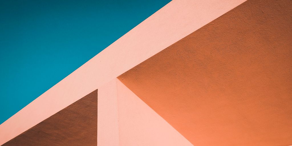 brown concrete building under blue sky during daytime