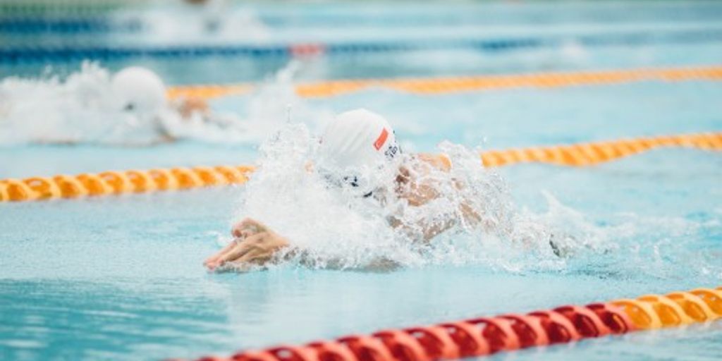 swimmers eating healthy snacks poolside
