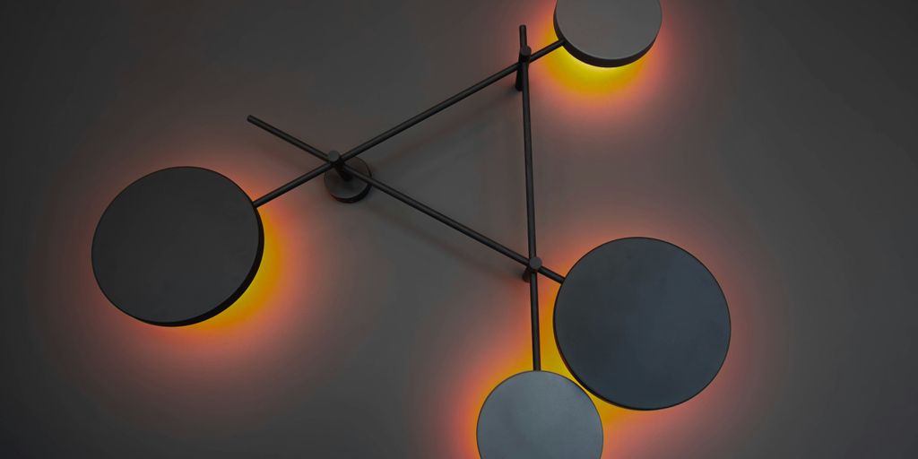 a clock with three circular lights on it