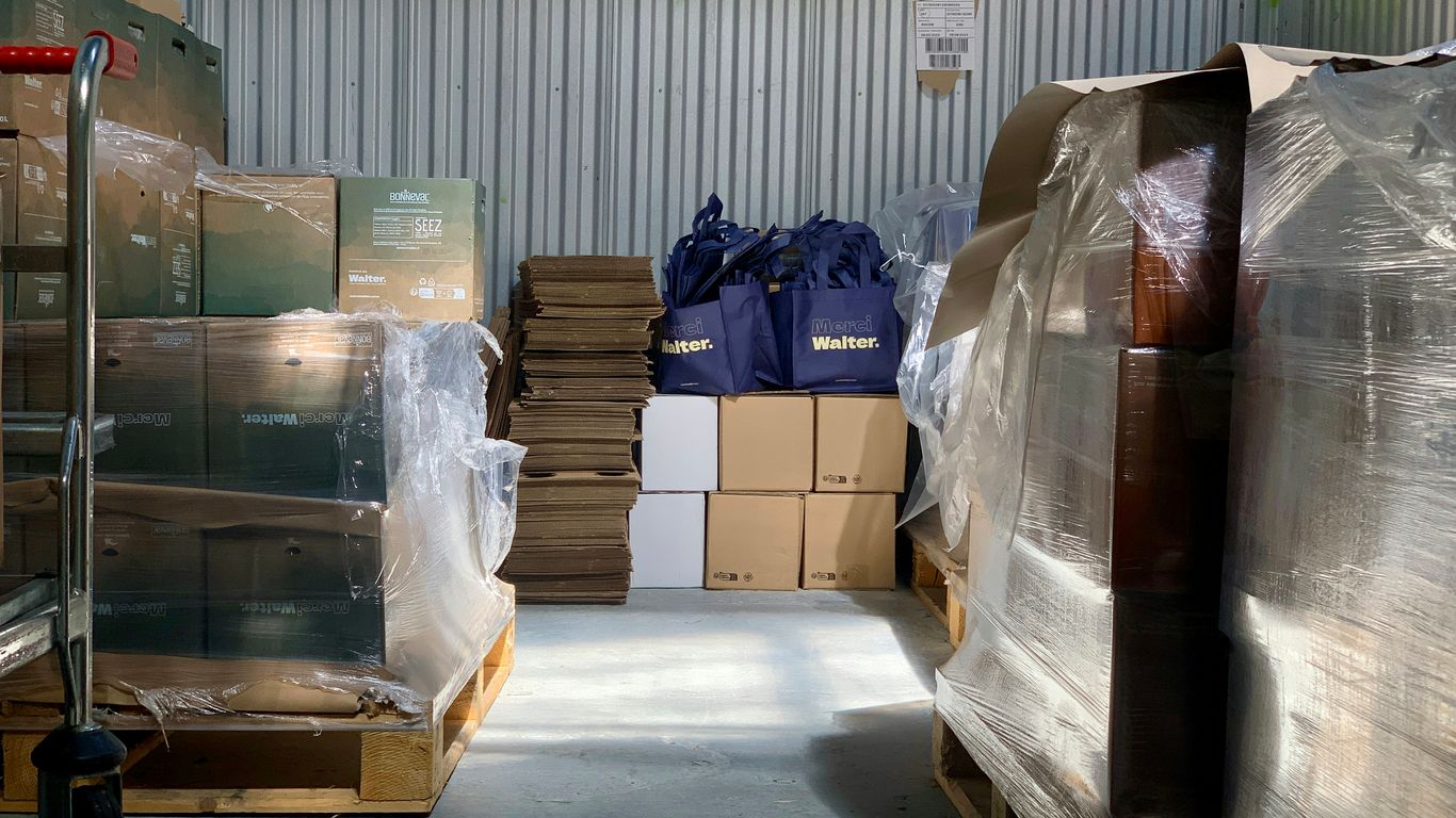 a warehouse filled with lots of boxes and bags