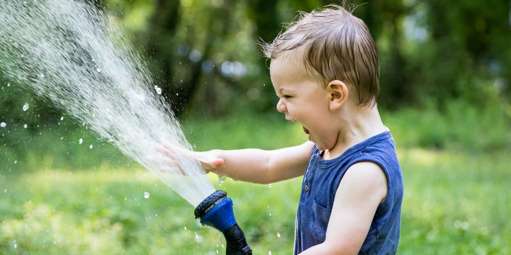 toddler playing water