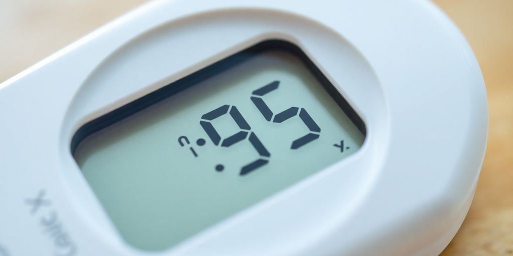 Blood sugar monitor with glucose readings.