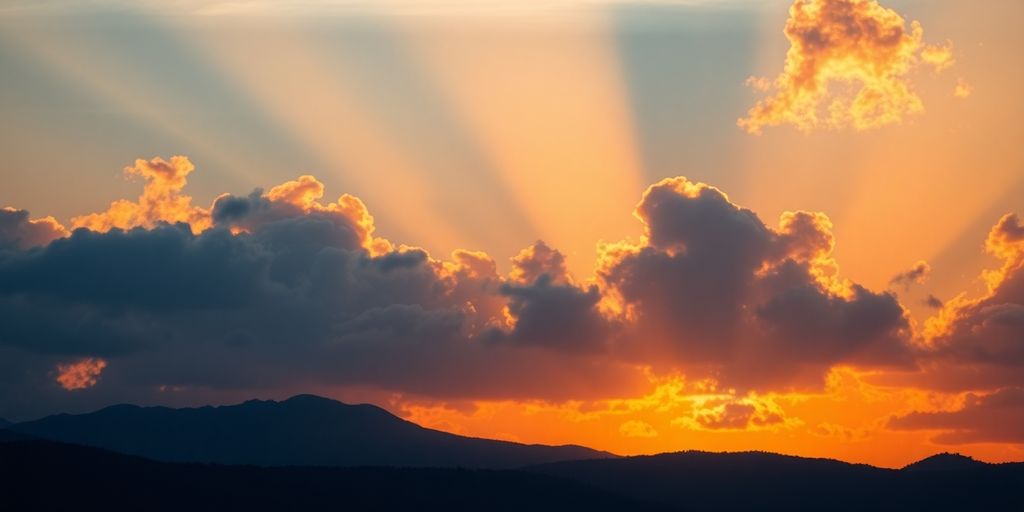Sunrise over mountains with motivational quote.