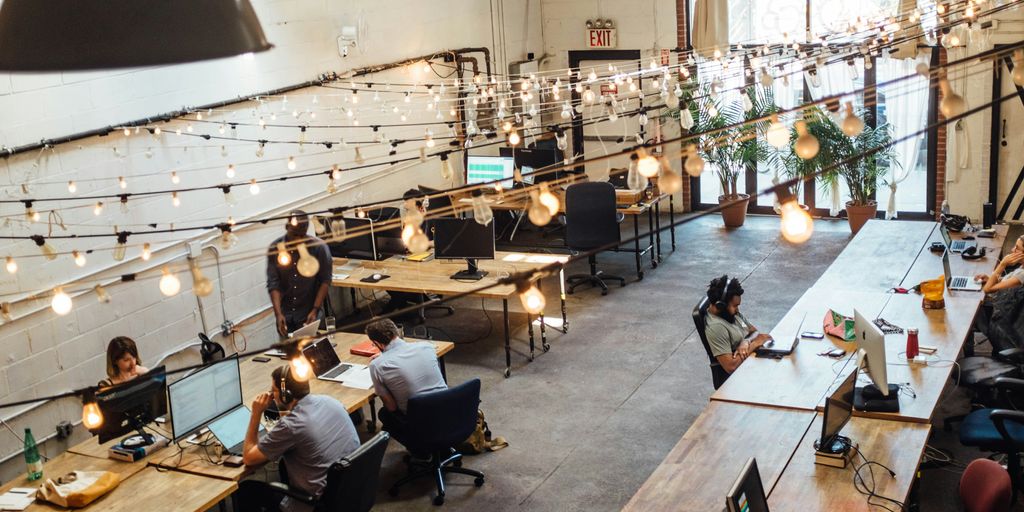 Top Chicago IT Companies Revolutionizing the Tech Industry 2 people sitting in front of computer monitors