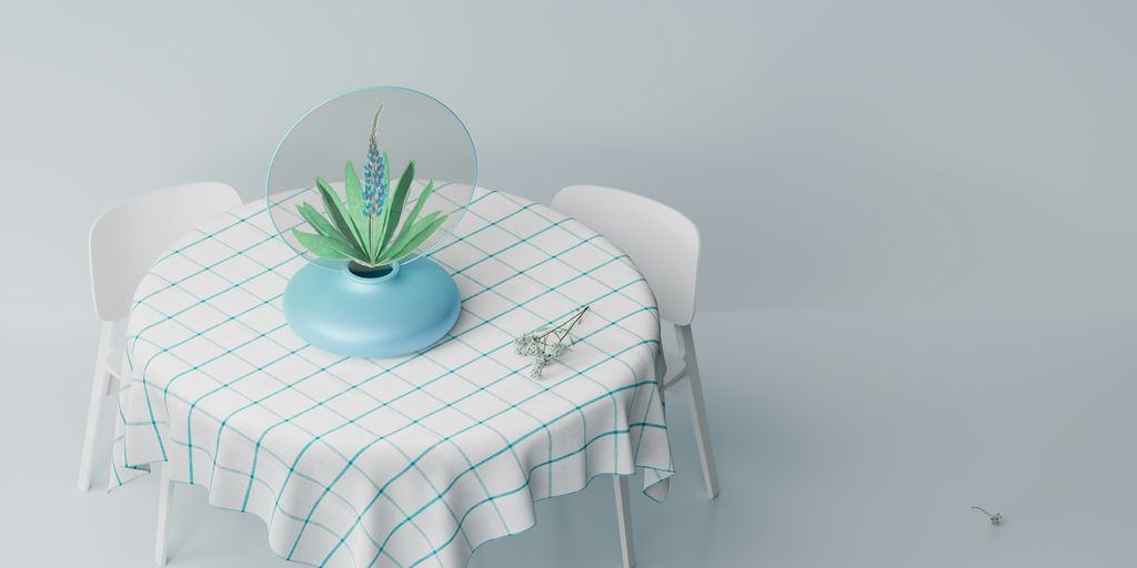 a table with a vase of flowers on it