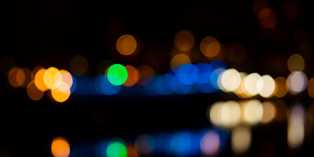 A blurry photo of a city at night