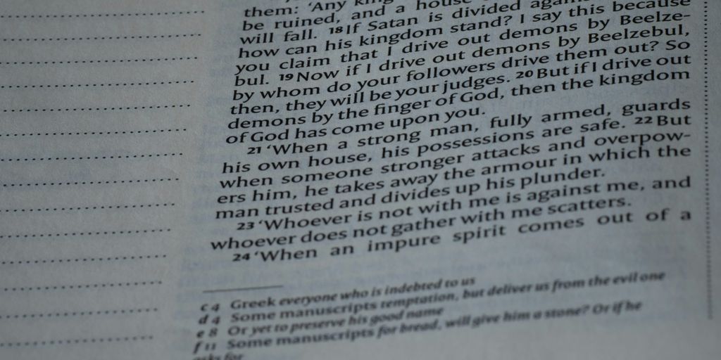 A close up of an open book with text