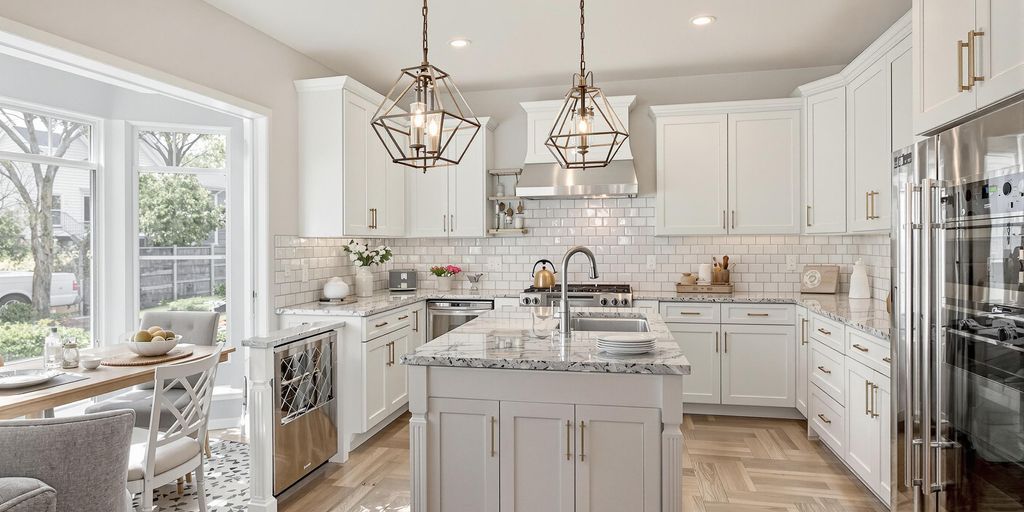 Modern kitchen with sleek design and abundant natural light.