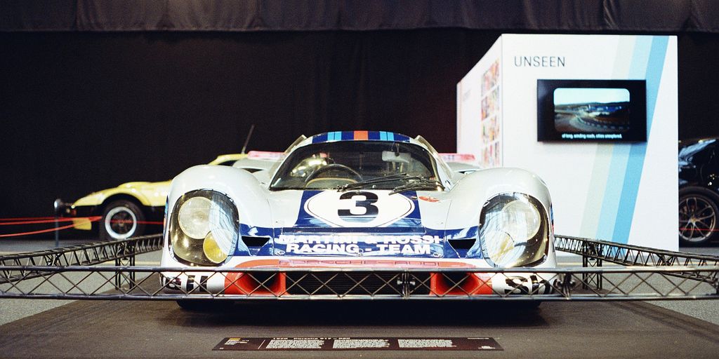 a race car on display in a showroom