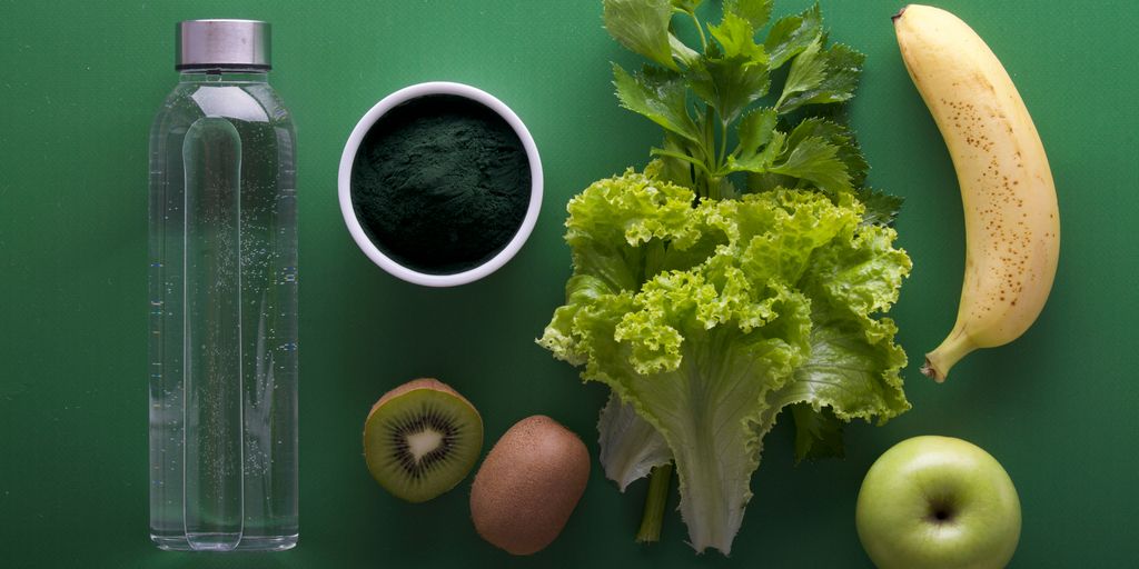 assorted fruits and vegetables on green surface