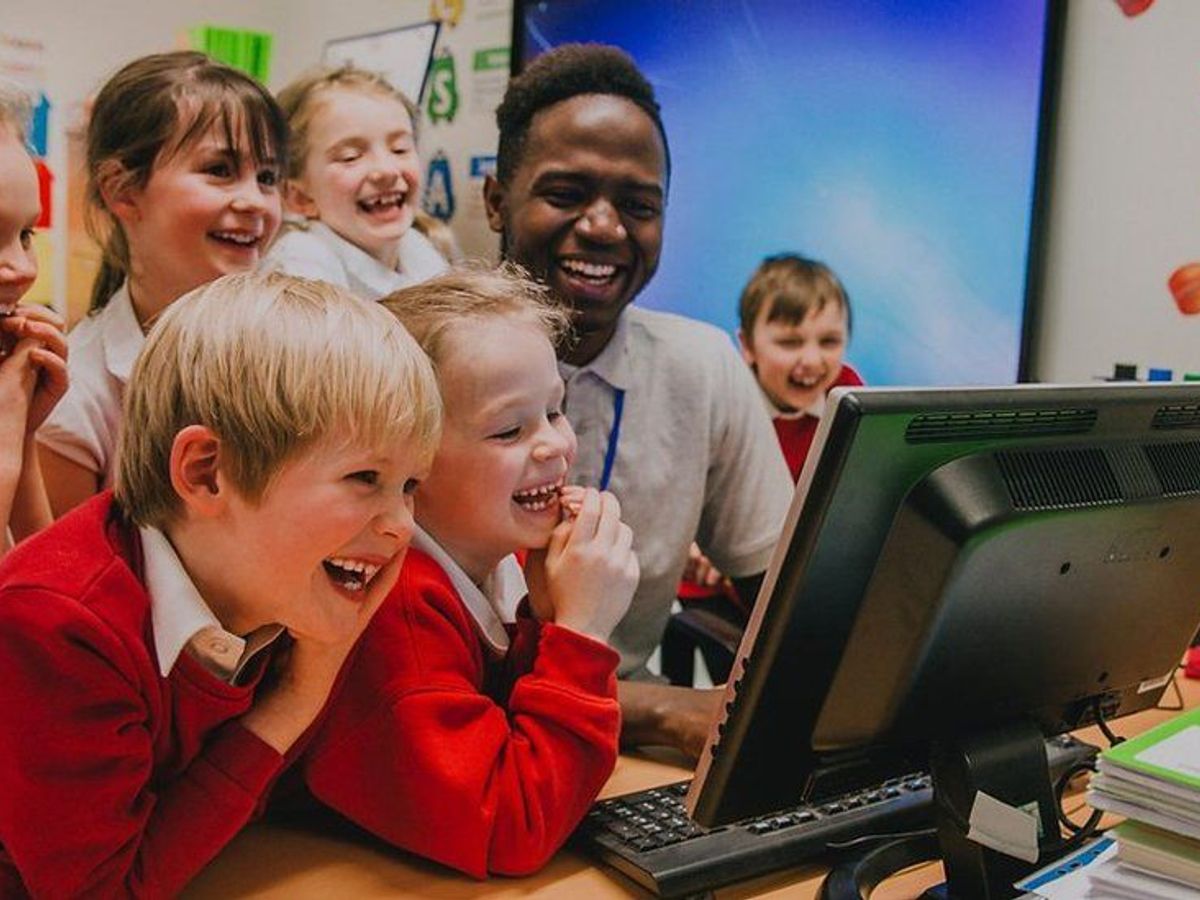 people laughing in a classroom