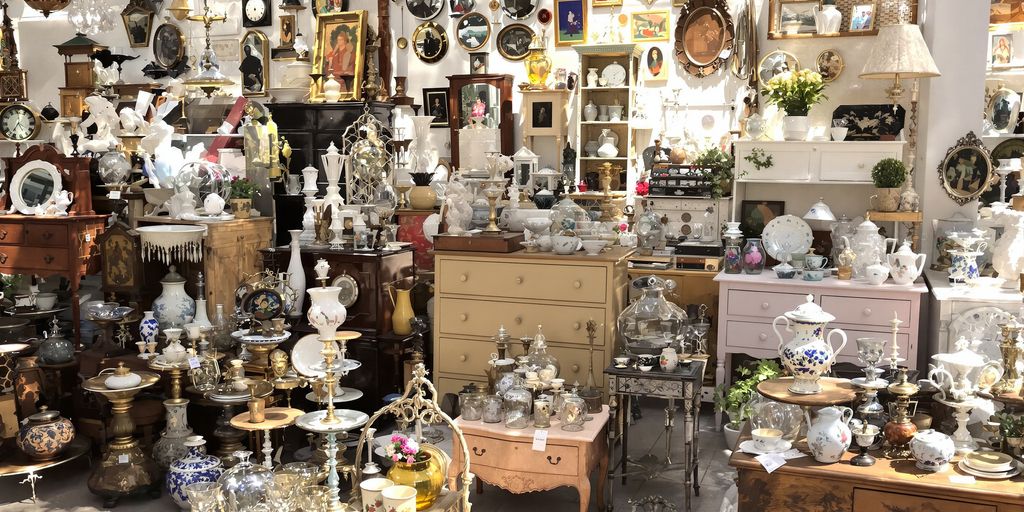 Antique furniture and decorative items arranged pleasingly.