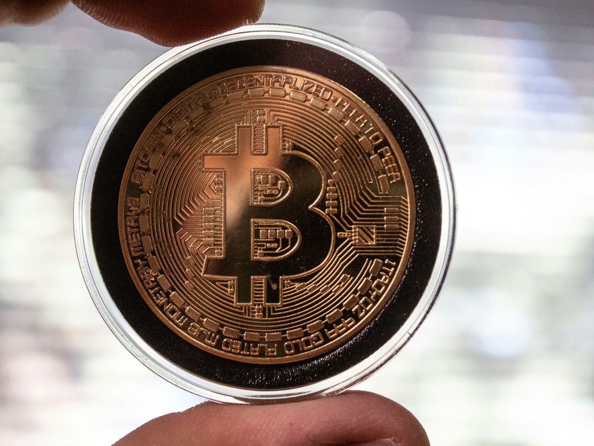 gold and black round coin