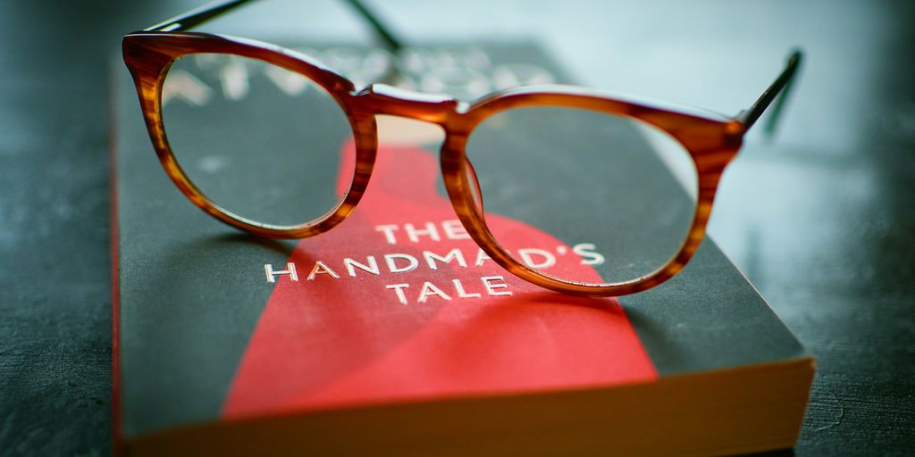 eyeglasses on book