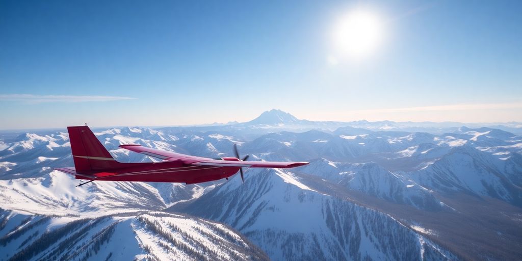 A small bush plane flying over a snowy mountain range.