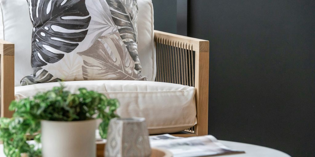 white throw pillow on white sofa chair