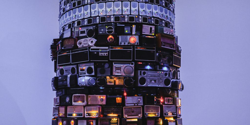 a very tall tower with many electronic devices on it