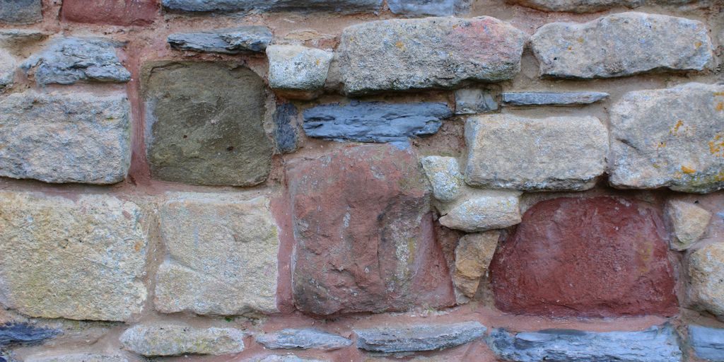 a close up of a wall made of rocks