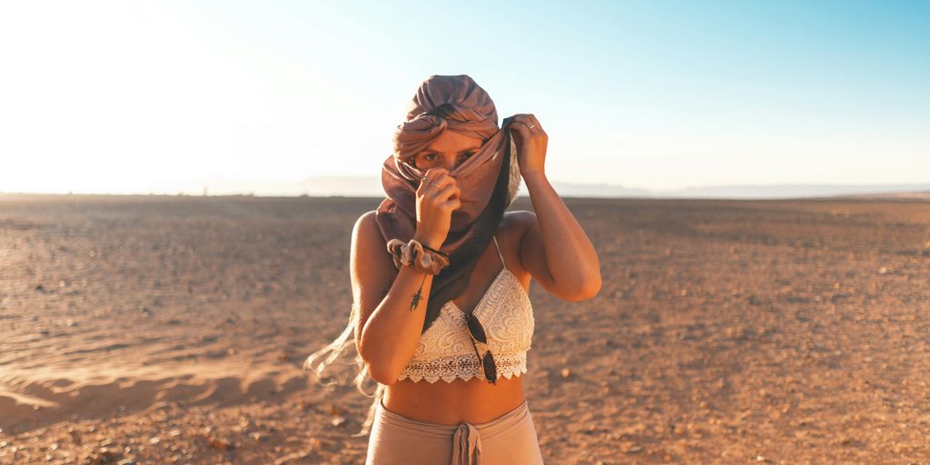 woman standing on desert