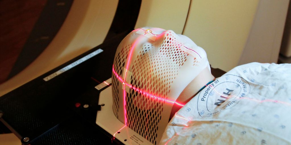 person lying inside MRI machine