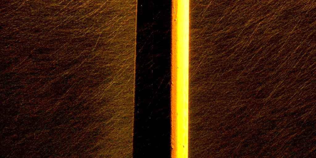 a street sign on a pole in the snow