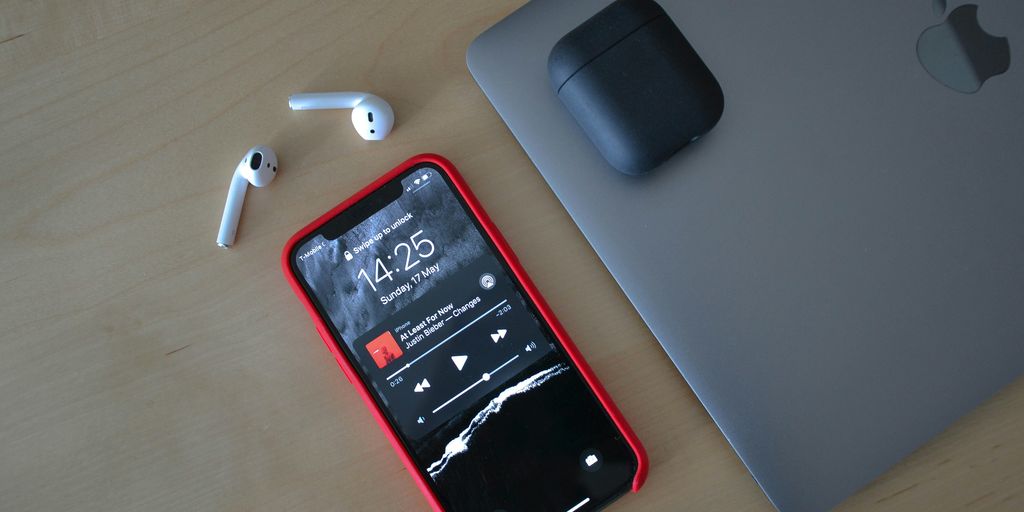 black iphone 5 on white table