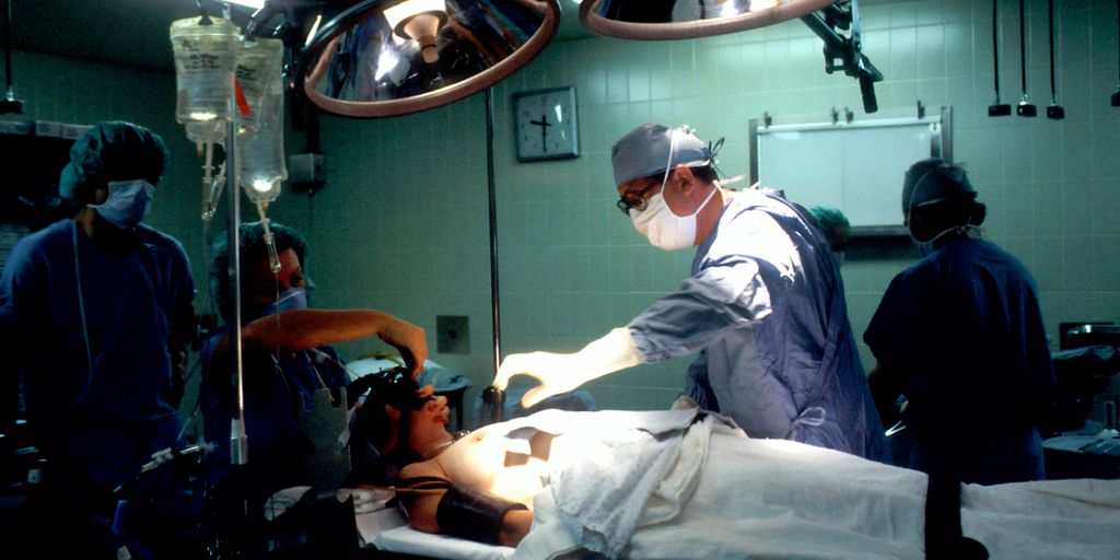 doctor and nurses inside operating room