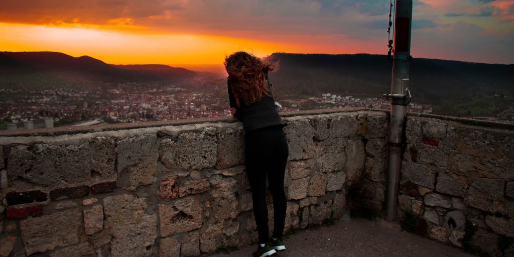 woman wearing black legging during sunset