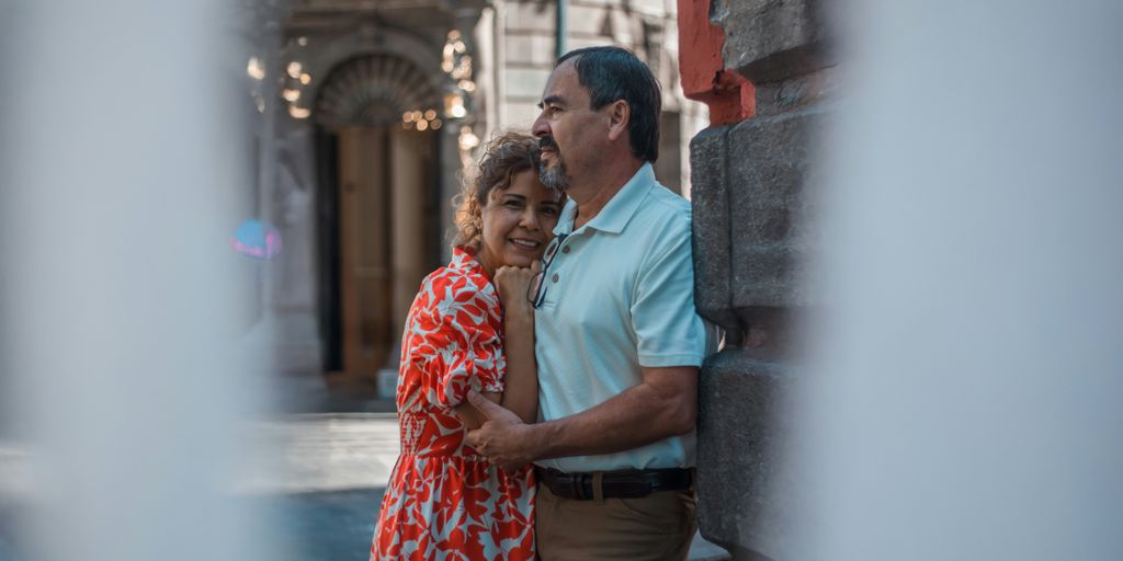 A man and a woman standing next to each other