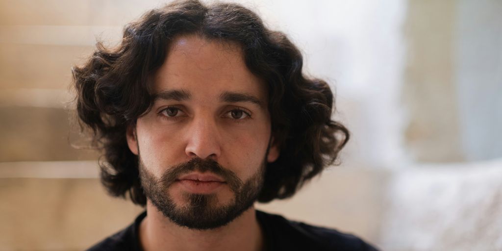 a man with curly hair