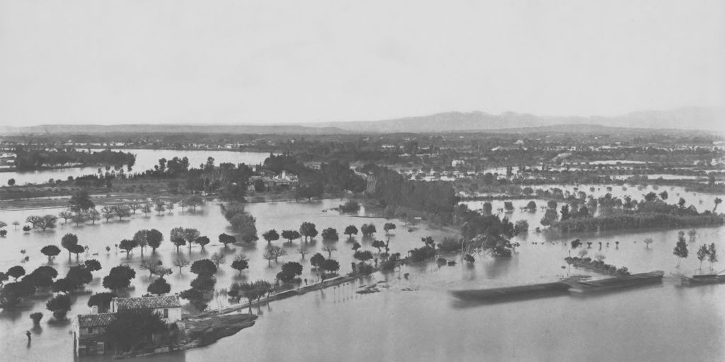 a black and white photo of a flooded area