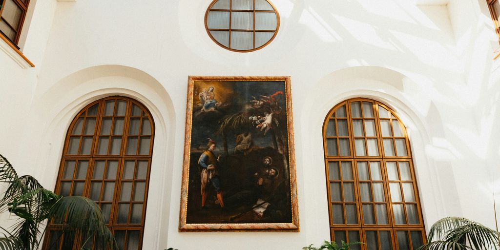 white framed painting on white wall