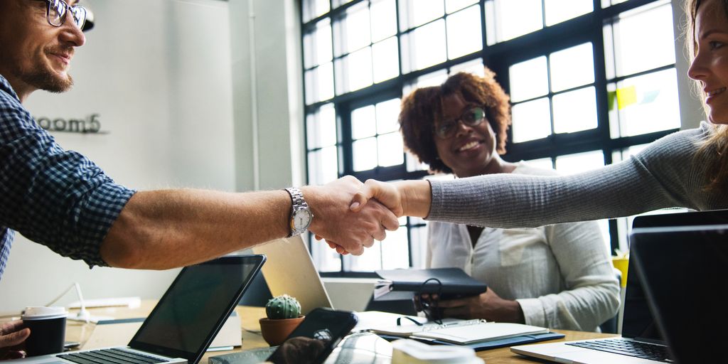 business collaboration in a tech office