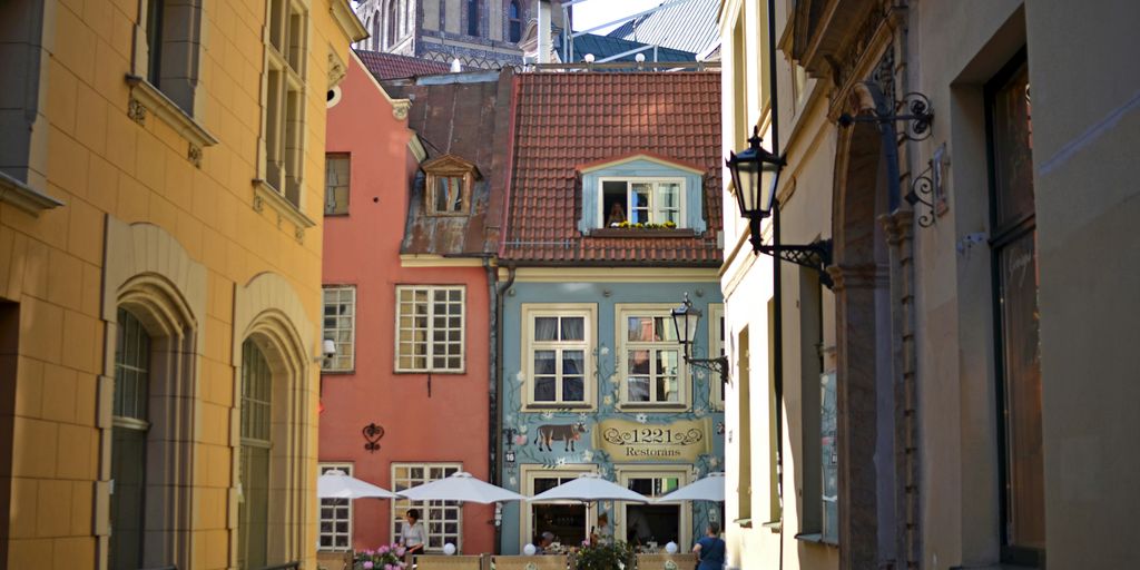 A charming european street with colorful buildings.