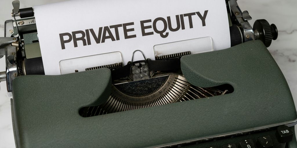 a close up of a typewriter with a paper that reads private equity