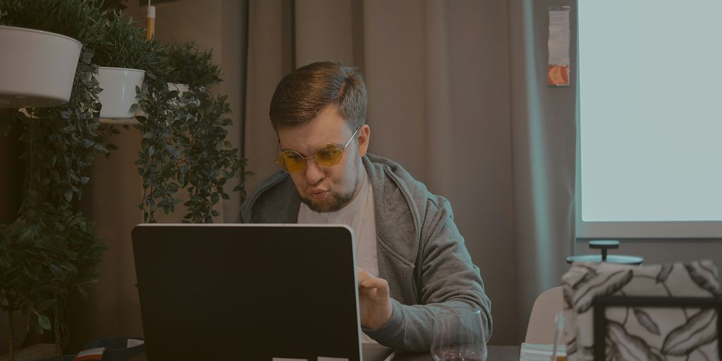 man working on laptop
