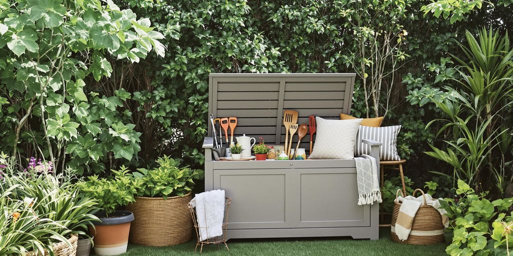 Compact storage bench in a stylish backyard setting.