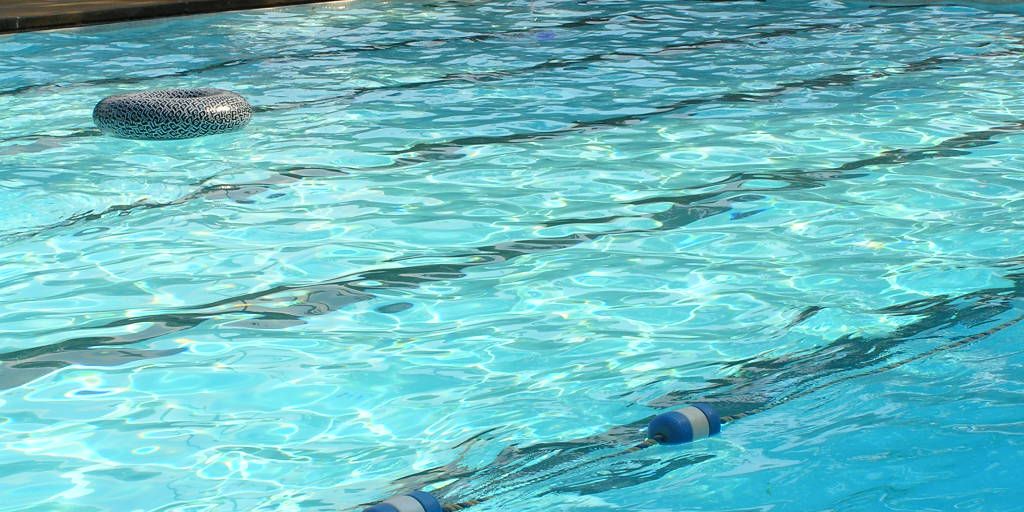 swimmer eating raisins poolside