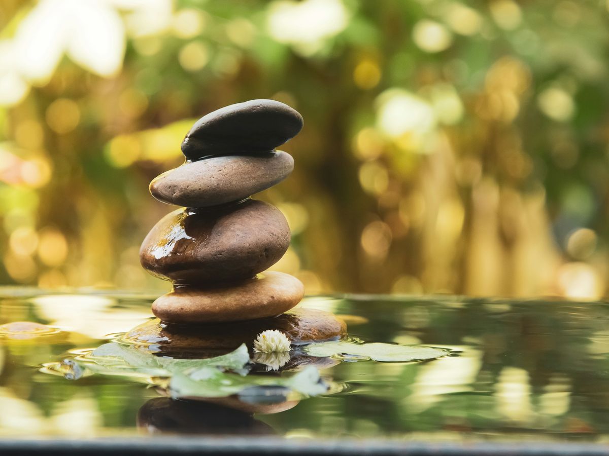 A stack of rocks sitting on top of a table
