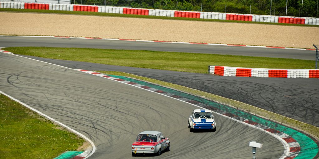 two racing cars on race track