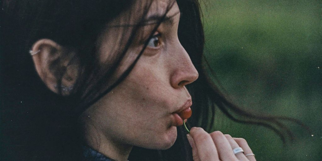 woman in black shirt smoking