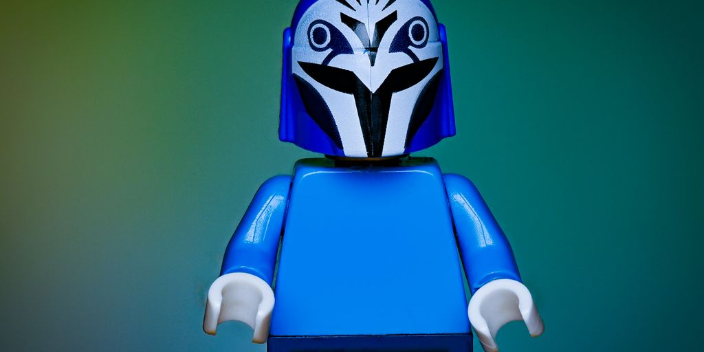 A lego star wars character with a blue helmet