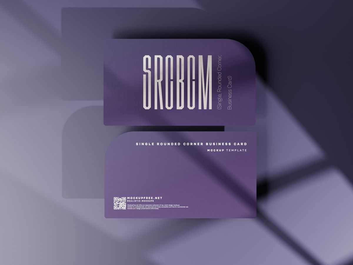 a purple business card with a shadow on it