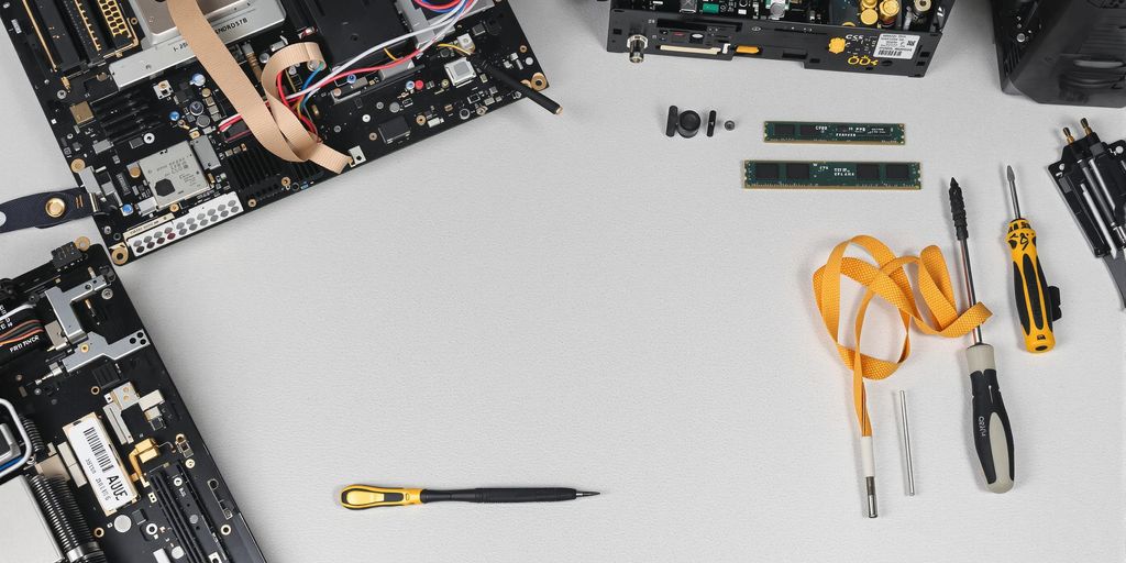 Tools and components for building a PC.