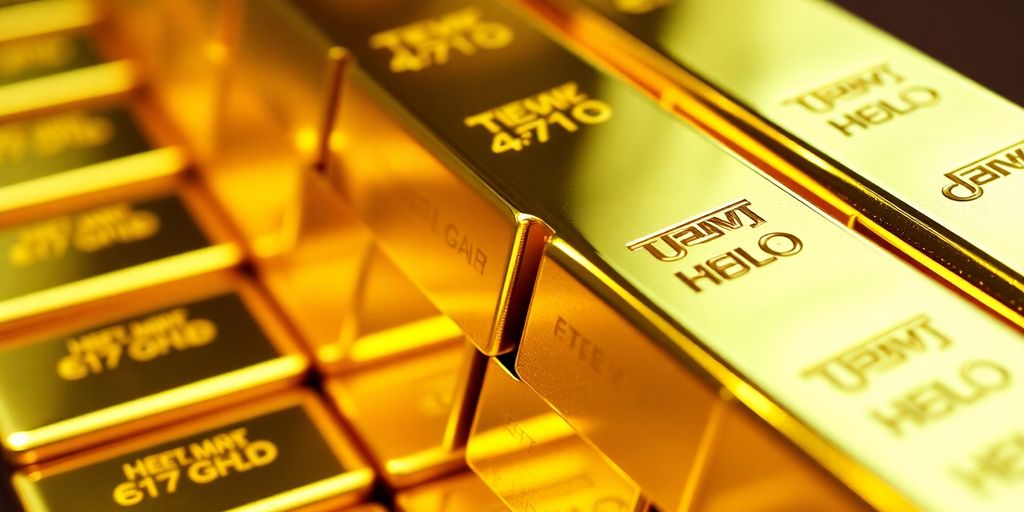 Lingots d'or empilés, symbolisant l'héritage et la richesse.