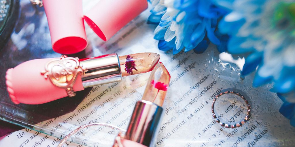 two clear and red lipsticks